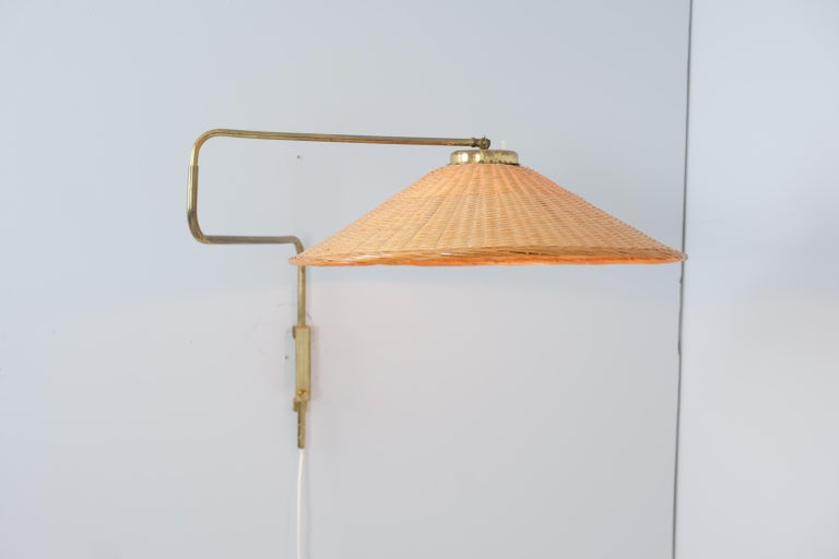 Vintage Finnish Design Adjustable Wall Lamp in Brass & Wicker, Valinte