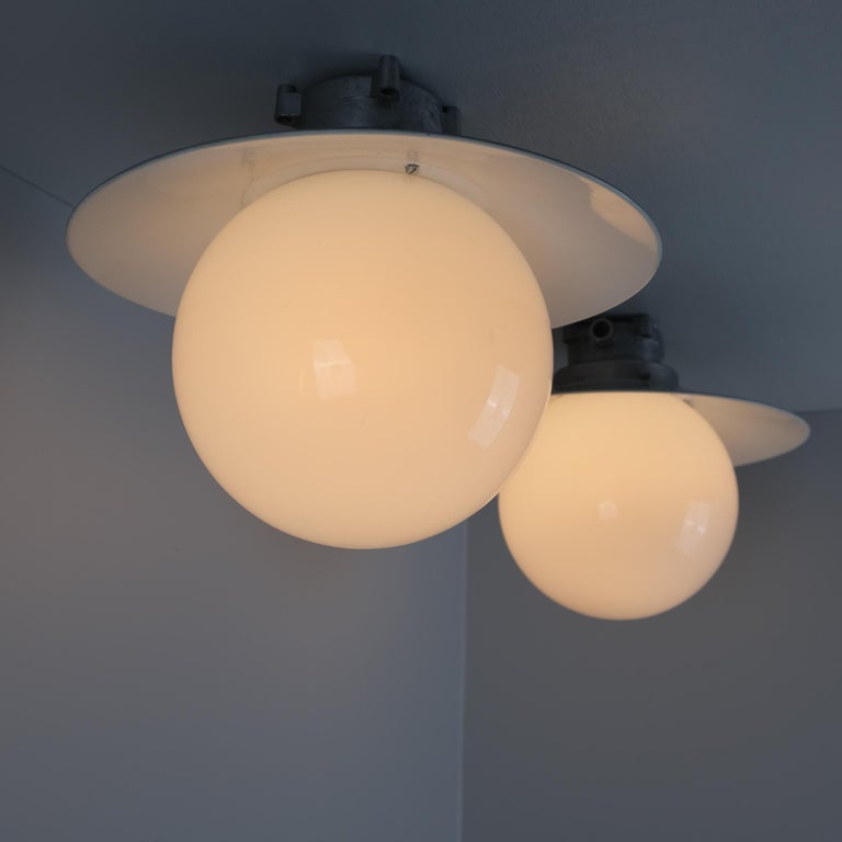 Pair of Paavo Tynell Outdoor / Indoor Industrial lamps Model H9-100, Idman