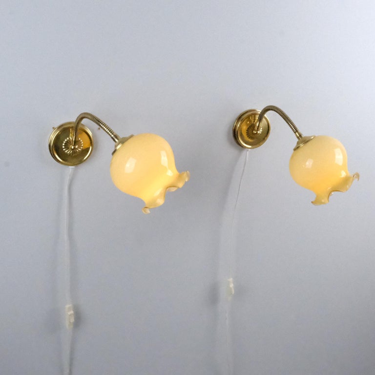 Pair of Finnish Design Wall Lamps, Brass and Adjustable Glass Flower Bud Shades