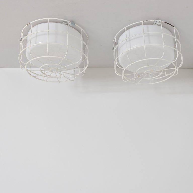 Pair of Mid-Century White Flush Mounts with Metal Cage Protectors, Finland 1960s